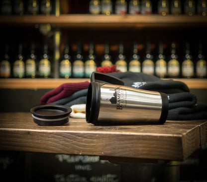 Stainless steel travel mug with &